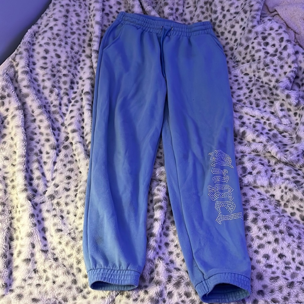 Blue sweatpants joggers, “ANGEL” on right leg of pant, Brand: Rue 21, size L
